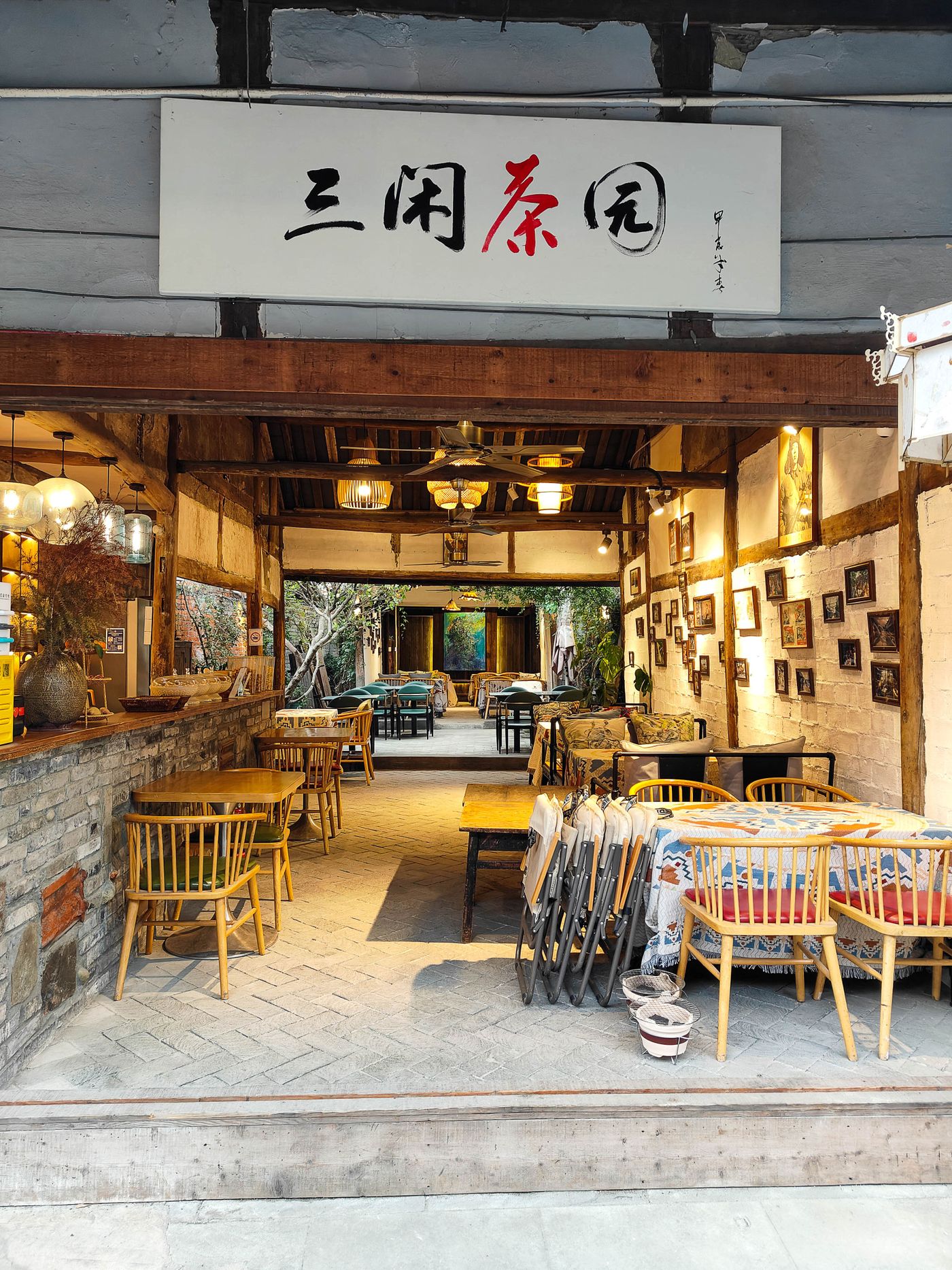 Warm wooden interior and bamboo chairs in a traditional Chengdu teahouse